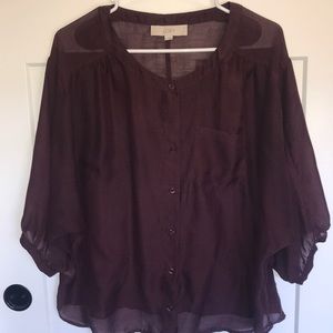 Dolman sleeve button up top.